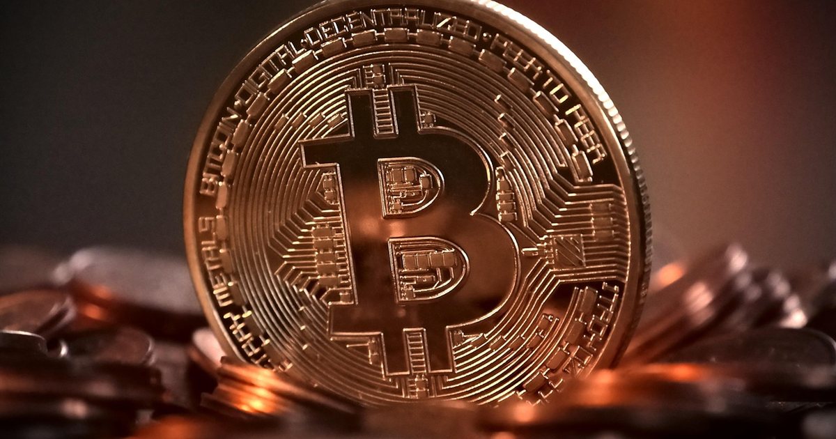 Shiny cryptocurrency coins stacked together